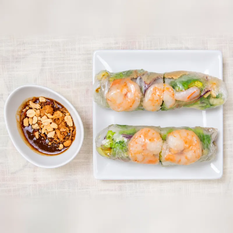 Fresh shrimp spring rolls in rice paper with peanut hoisin sauce