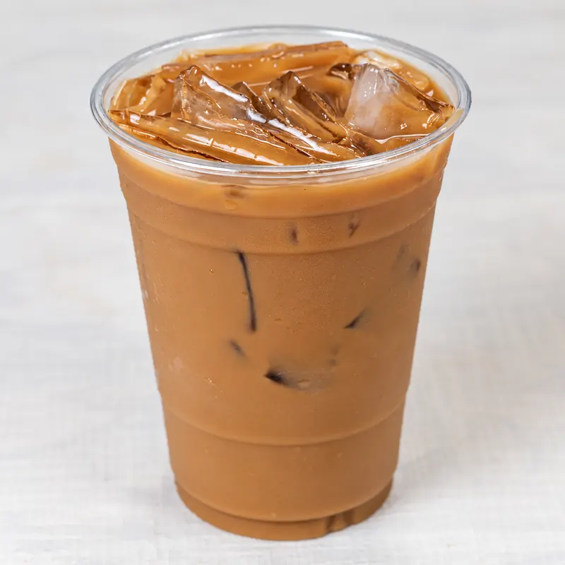 Vietnamese iced coffee with condensed milk in a tall cup